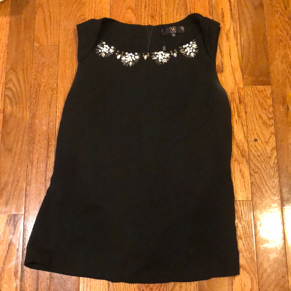 Black top with jewel neckline